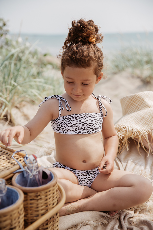 LOU bikini set features thin adjustable tying shoulder strap to provide room for the perfect fit and growth.