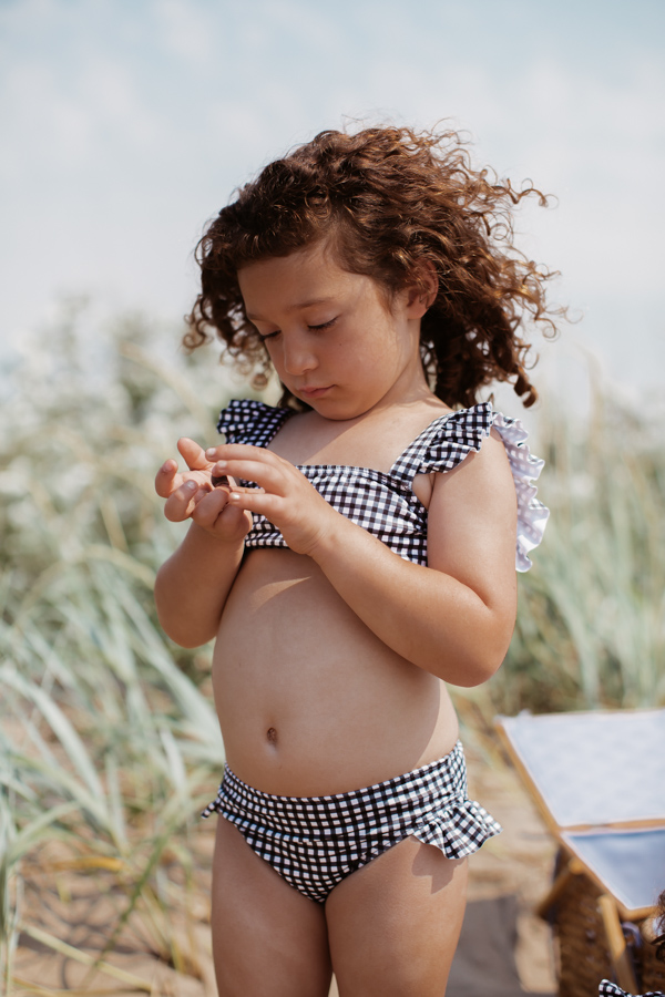 Our DAISY bikini set in gingham gets all of the ‘awws’ in those holiday photographs. It's comfortable and stretchy enough for every beach adventure.
